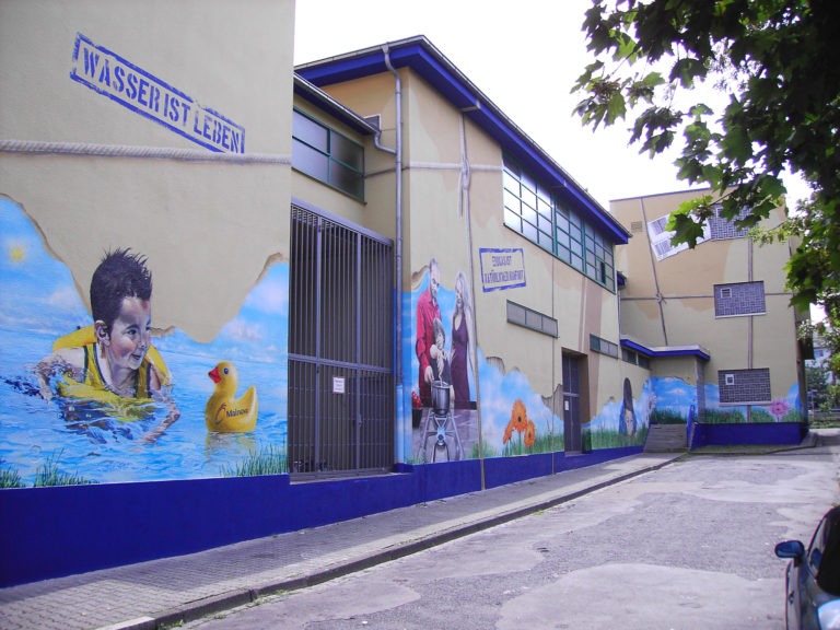 graffitiauftrag-graffitikuenstler-artmos4-mainova-menschen-fotorealistisch-frankfurt