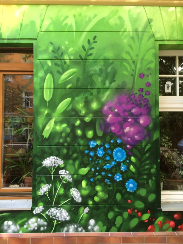 graffitikuenstler-graffitiauftrag-artmos4-graffiti-hausing-pflanzen