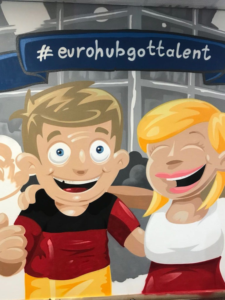 graffitiauftrag-graffitikuenstler-artmos4-asos-2018-comic-inne-gesichter-menschen-bunt-deutschland