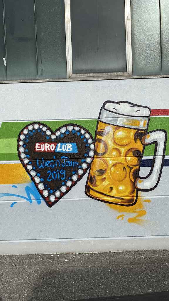 graffitiauftrag_graffitikuenstler_artmos4_EuroLub_2022_aussen_Produkte_Fahrzeug_München_03