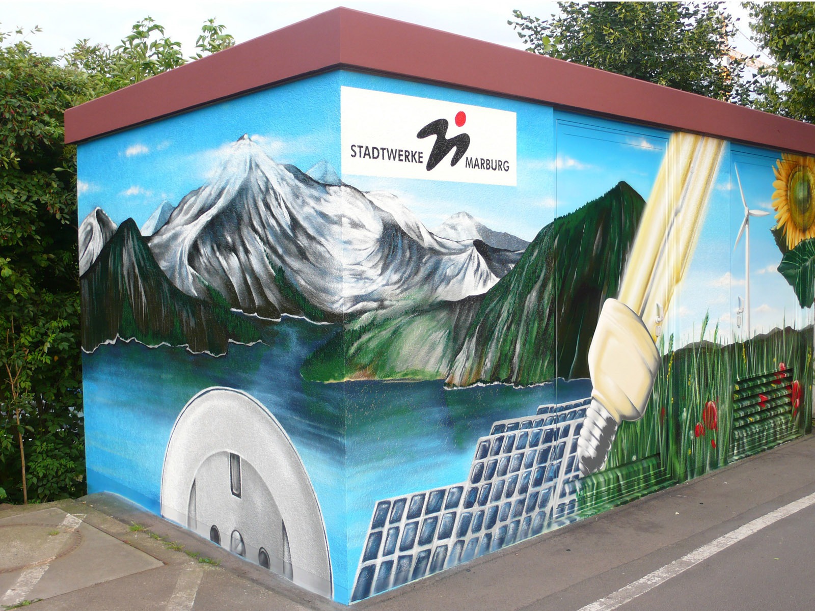 graffitiauftrag_graffitikuenstler_artmos4_stadtwerke_marburg_landschaft_pflanzen_fotorealistisch_energie graffitiauftrag_graffitikuenstler_artmos4_stadtwerke_marburg_landschaft_pflanzen_fotorealistisch_energie